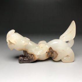 An Exquisite White Jade Beast Hand Piece