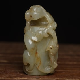 An Exquisite White Jade Dragon Pendant