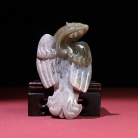 An Exquisite Gaogu Jade Phoenix Hand Piece