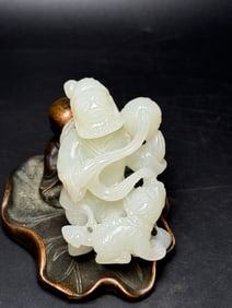 An Exquisite White Jade Figure Lion Hand Piece