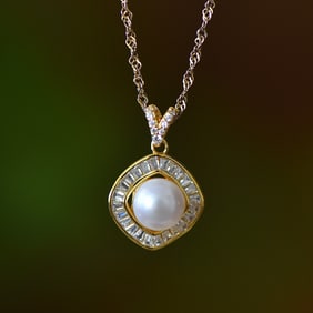 An Exquisite Sterling Silver-Gold Plated Inlaid White Jade Pendant