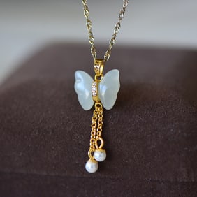 An Exquisite Sterling Silver-Gold Plated Inlaid White Jade Pendant