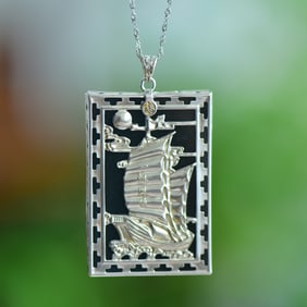 An Exquisite Sterling Silver Inlaid White Jade Pendant