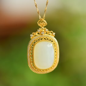 An Exquisite Sterling Silver-Gold Plated Inlaid White Jade Pendant