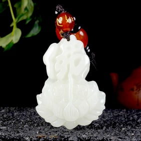 An Exquisite White Jade Lotus Pendant