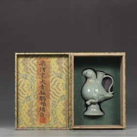 An Exquisite Ru yao Sky Blue Glazed Parrot Candlestick