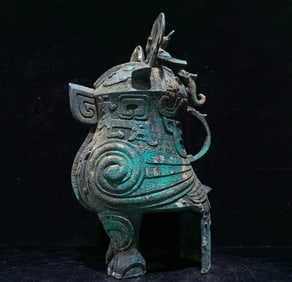 An Archaic Bronze Beast-Face Pattern Ancient Owl-Shaped Zun