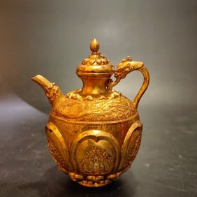 An Exquisite Gilt Bronze Buddha and Phoenix Pattern Flagon
