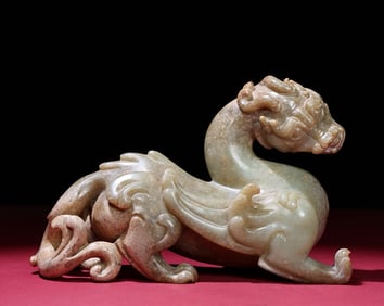 An Exquisite White Jade Auspicious Beast Ornament