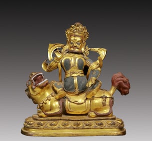 A Solemn Gilt Bronze Statue of Mammon Rides the Lion
