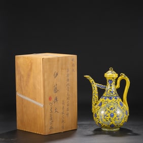 A Rare Yellow Ground Blue and White Lotus Pattern Ewer