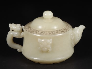 An Exquisite White Jade Beast-Face Pattern Teapot
