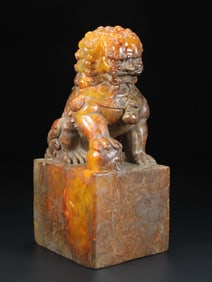 An Exquisite Archaic Jade Lion Ornament