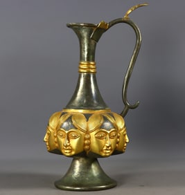 An Exquisite Gilt Bronze Human Facial Pattern Ewer
