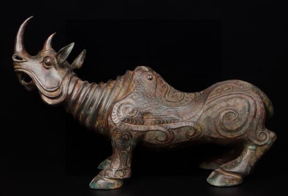A Exquisite Bronze Phoenix Pattern Rhinoceros Ornament