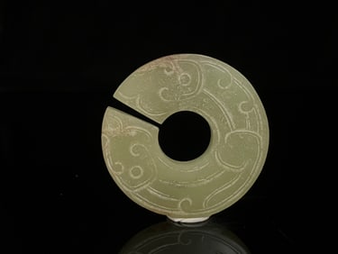 An Exquisite White Jade Pendant