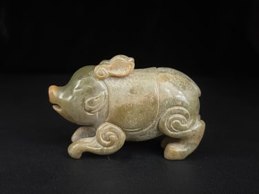 An Exquisite White Jade Pig Ornament