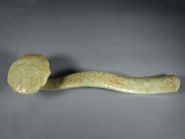 An Exquisite White Jade Eight Treasures Pattern Ruyi Ornament