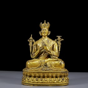 A Solemn Gilt Bronze Statue of Guru