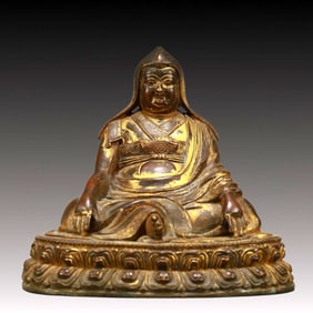 A Solemn Gilt Bronze Statue of Guru