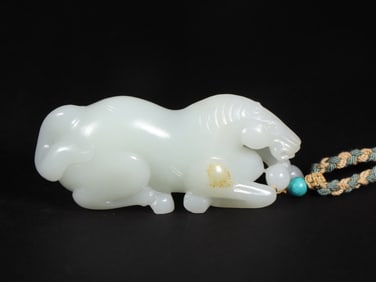 An Exquisite White Jade Horse Pendant