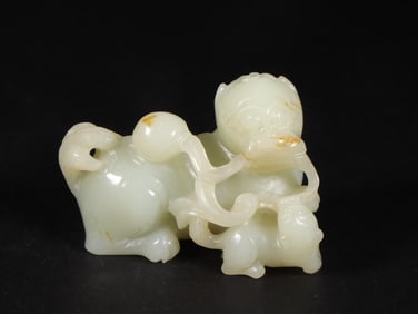 An Exquisite White Jade Lion Ornament