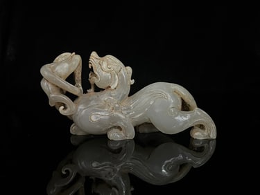An Exquisite White Jade Auspicious Beast Ornament