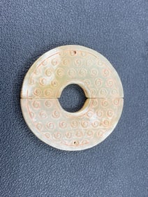 An Exquisite White Jade Pendant