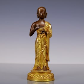 A Rare Gilt Bronze Statue of Guru
