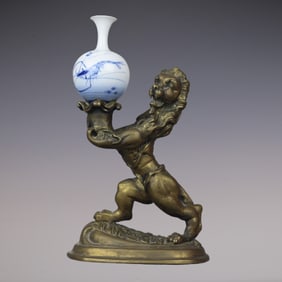 An Exquisite Blue and White Inlaid Bronze Lion c