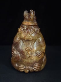 An Exquisite White Jade Bear-Shaped Vase