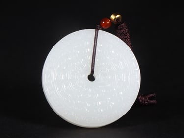 An Exquisite White Jade Pendant