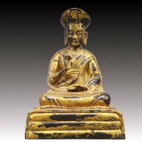 A Solemn Gilt Bronze Statue of Guru