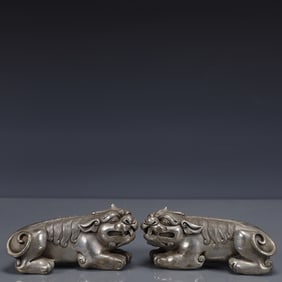 A Pair of Exquisite Silver-plated Bronze Auspicious Beast Ornaments