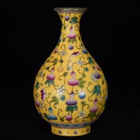 An Exquisite Yellow Ground Famille-Rose Painted Gold Bats and Gourd Pattern Vase