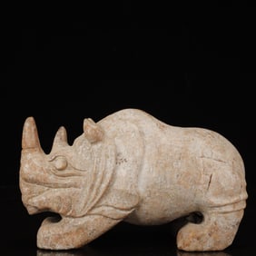 An Archaic Hongshan Culture Yellow Jade Rhinoceros Ornament