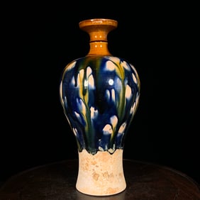 An Exquisite Tang Tri-Color Glazed Pottery Flower Pattern Vase