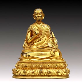 A Solemn Gilt Bronze Statue of Guru