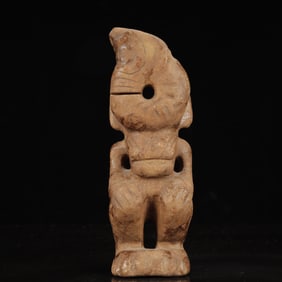 An Archaic Hongshan Culture Yellow Jade Beast Pattern Ornament
