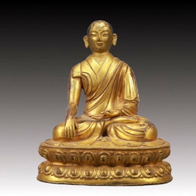 A Solemn Gilt Bronze Statue of Guru