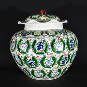 A Rare Wucai Figure and Shou-Character Pattern Cover Jar