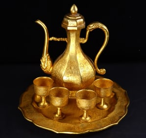 A Set of Fine Gilt Bronze Auspicious Cloud and Dragon Pattern Drinking utensils