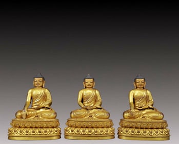 Three Brilliant Gilt-Bronze Figures Of Buddha