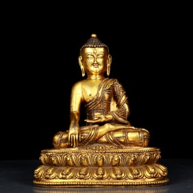 A Rare Gilt Bronze Statue of Sakyamuni