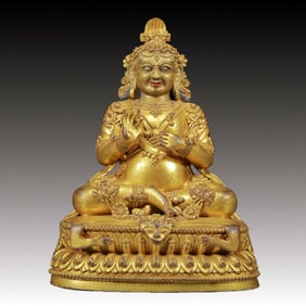 A solemn gilt bronze Vajra statue