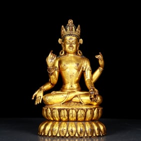 A Rare Gilt Bronze Statue of Four-arms Guanyin