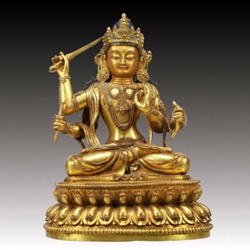 A Solemn Gilt Bronze Statue of Gautama’s Mother