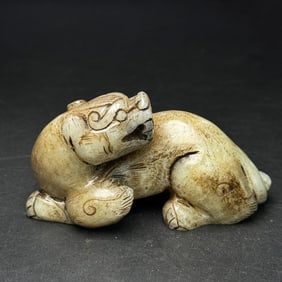 An Exquisite Gaogu Jade Auspicious Beast Ornament