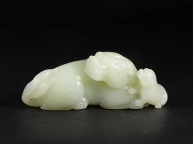 An Exquisite White Jade Auspicious Beast Ornament