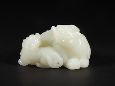 An Exquisite White Jade Auspicious Beast Ornament